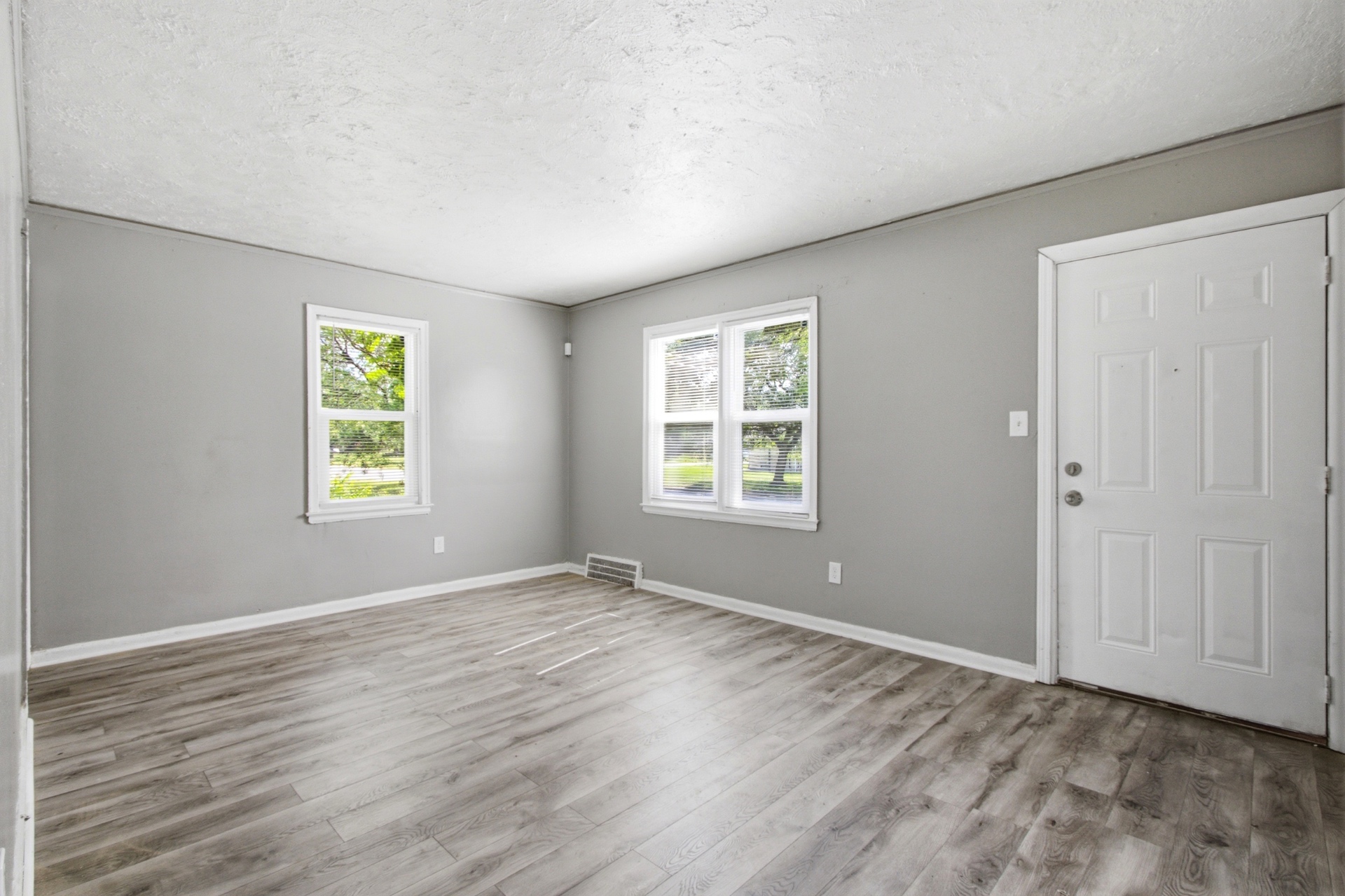 Freshly painted living space with natural light