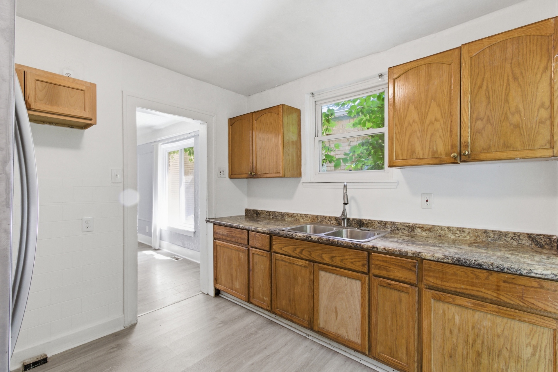 Kitchen with warm wood cabinets